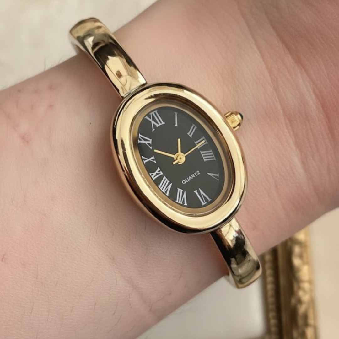 Cartier Women's Watch – Gold Tone – Oval Light Gold Dial – Roman Numerals – Quartz Movement – Mirror Edition