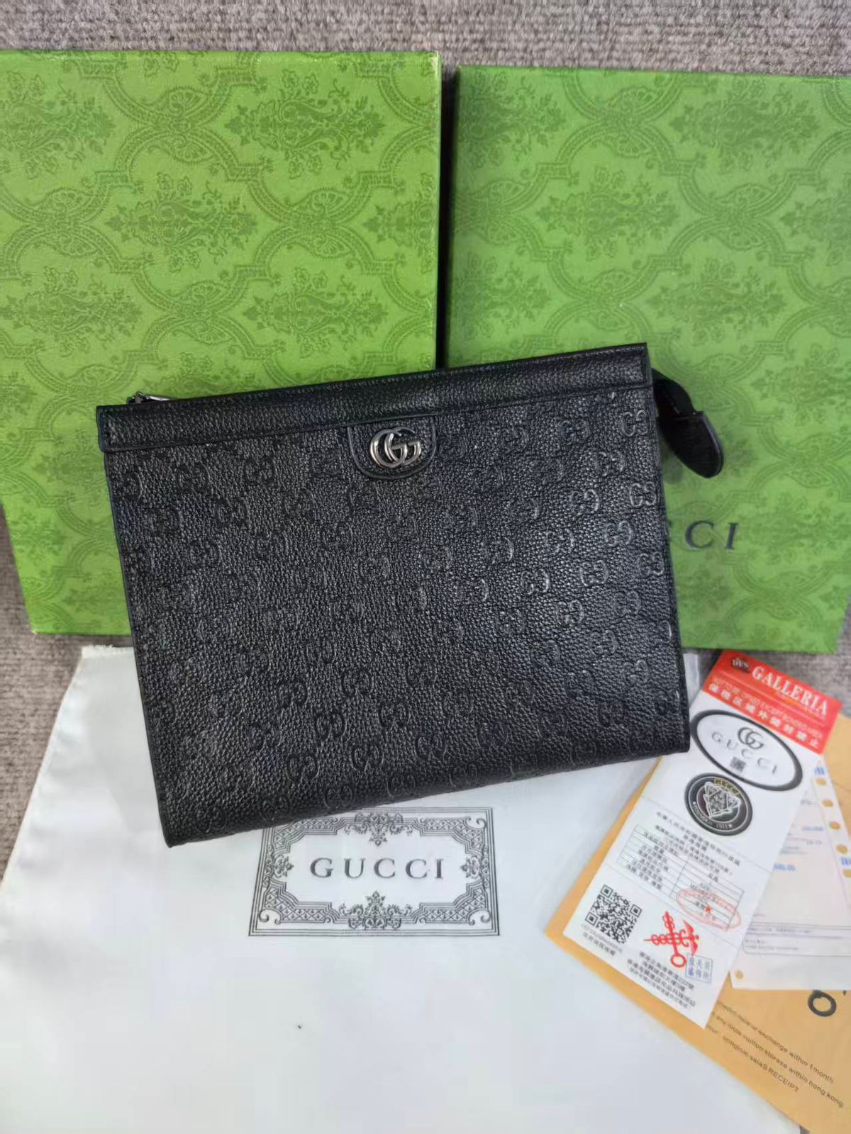 Gucci Black GG Embossed Leather Clutch – Unisex