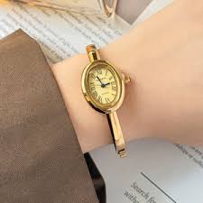 Cartier Women's Watch – Gold Tone – Oval Light Gold Dial – Roman Numerals – Quartz Movement – Mirror Edition