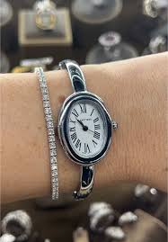 Cartier Women’s Watch – Silver Tone – Oval White Dial – Roman Numerals – Quartz Movement – Mirror Edition